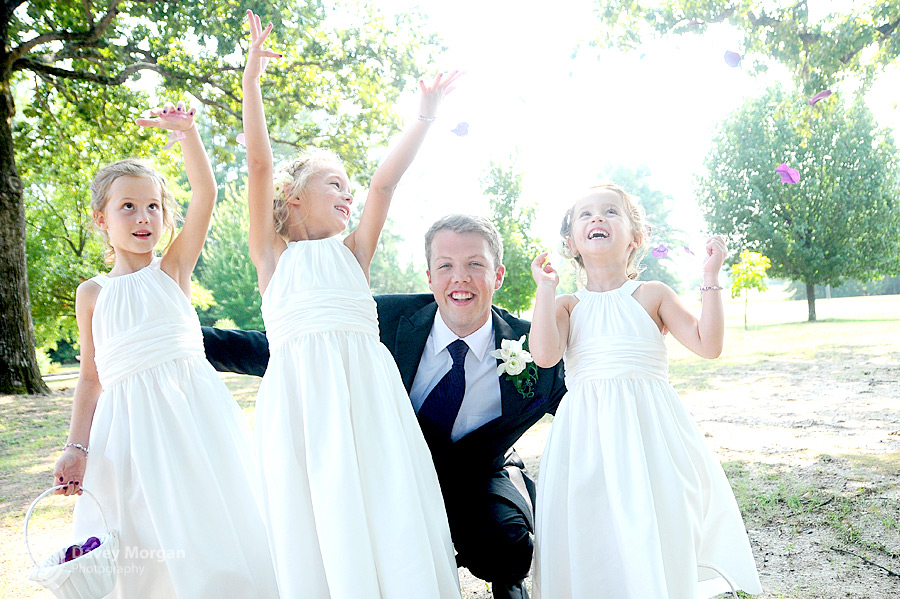 Flower girls throwing flowers in the air | Davey Morgan Photography
