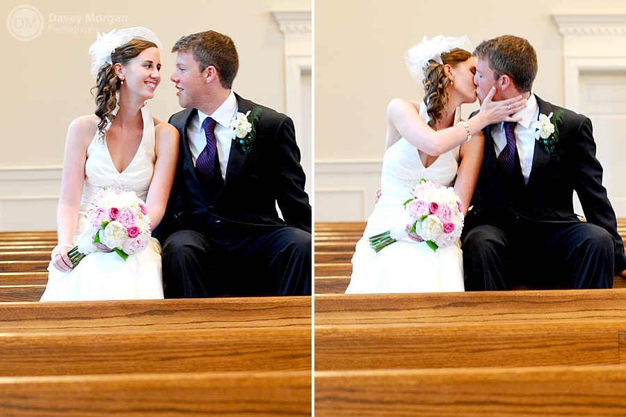 Bride and Groom sitting on church pew kissing | Davey Morgan Photography