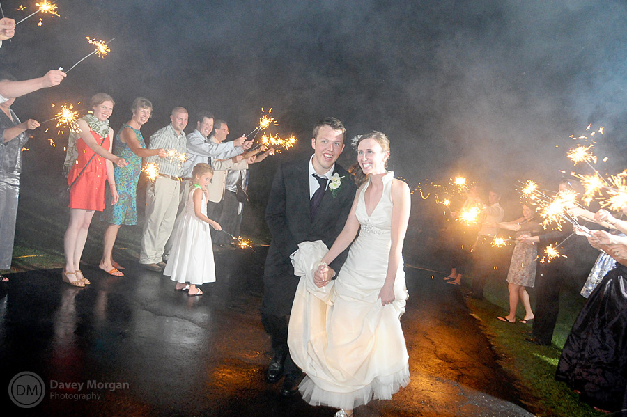 Running through sparklers at wedding reception | Davey Morgan Photography