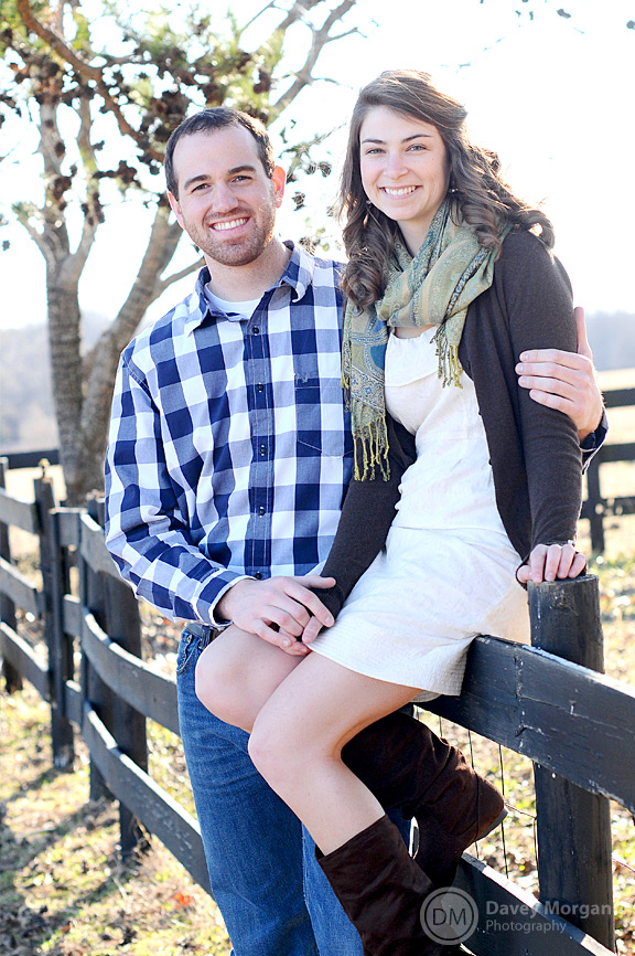 Engaged couple sitting on fence | Greenville, SC | Davey Morgan Photography 