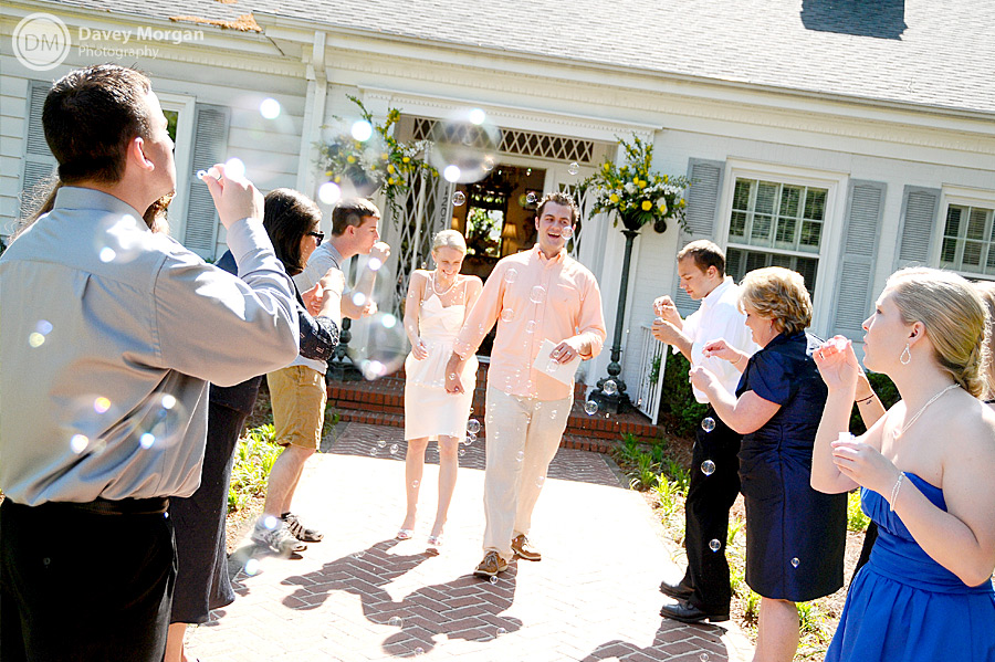 Bride and Groom leaving through bubbles at wedding reception | Davey Morgan Photography