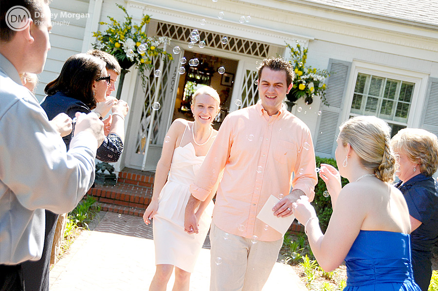 Blowing bubbles at bride and groom | Davey Morgan Photography