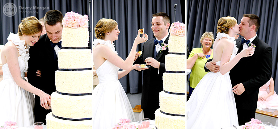Newlyweds cutting the wedding cake | Davey Morgan Photography