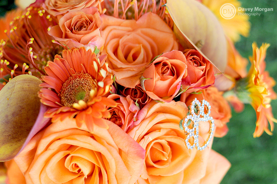 Clemson Tiger Paw Pin and Broach on Orange Clemson Flowers | Davey Morgan Photography