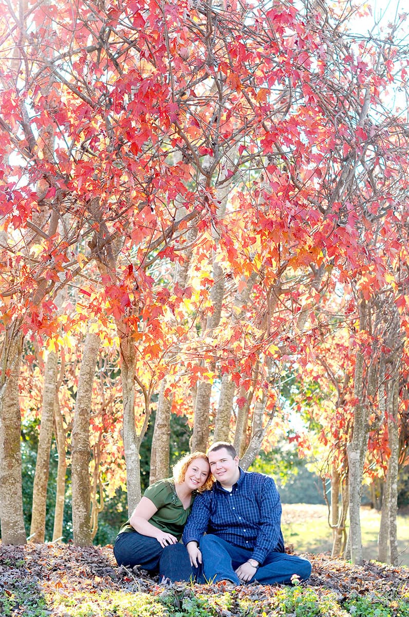 Clemson, SC Botanical Gardens engagement pictures in the fall with red leaves