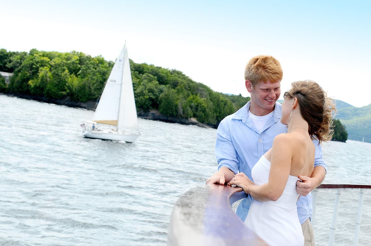 Engagement pictures on a boat in Vermont and New York on Lake Champlain | Destination wedding photographer