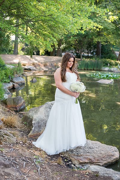 Bridal portrait with a pond at Furman University